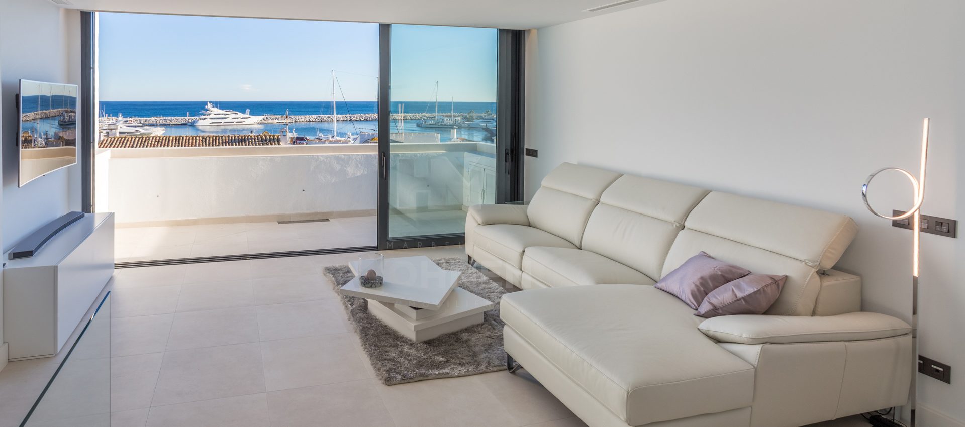 Contemporary duplex penthouse in the heart of Puerto Banus with fantastic panoramic views