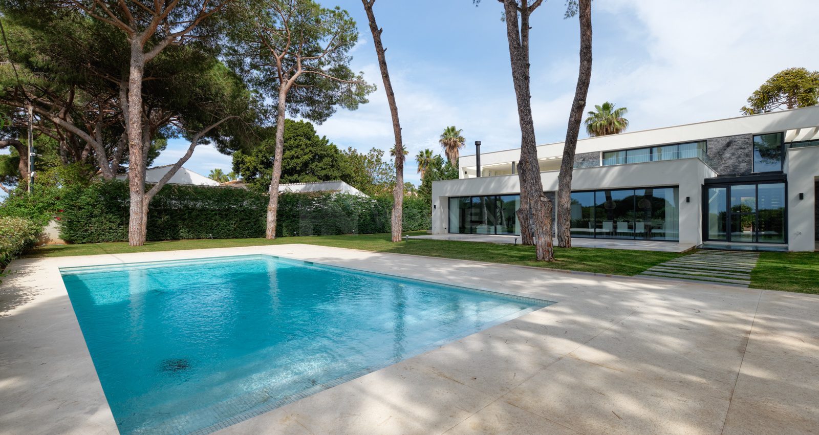 Top quality contemporary villa front line beach